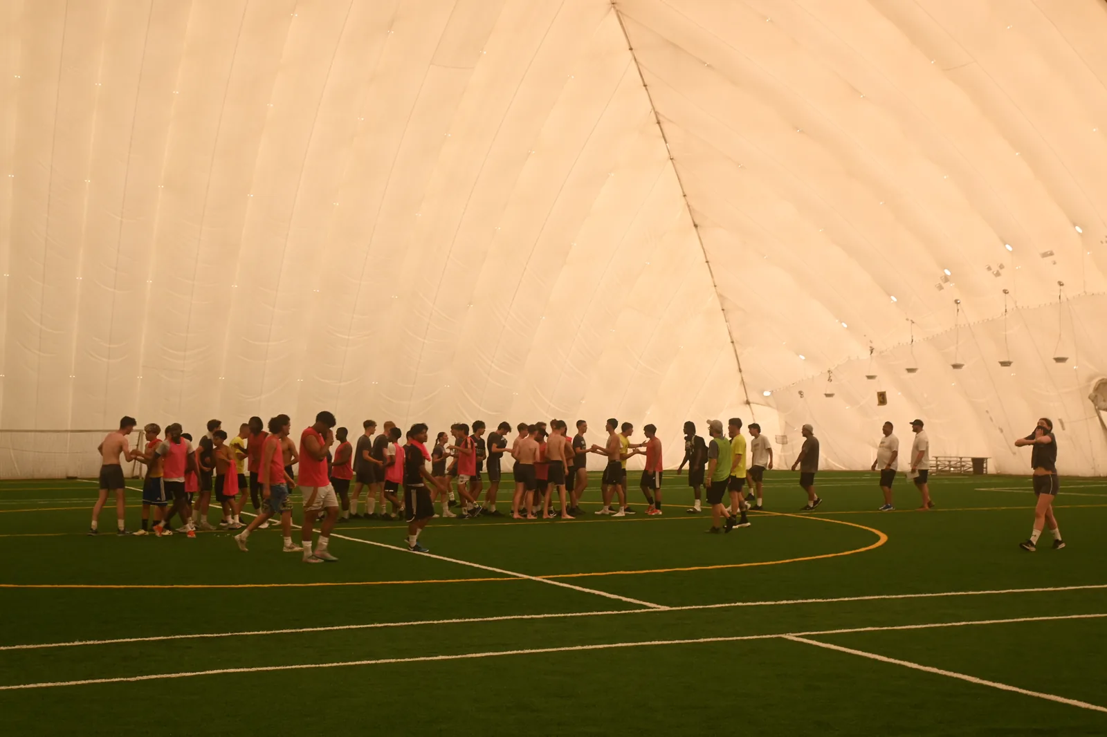 Teams lining up before the friendly match
